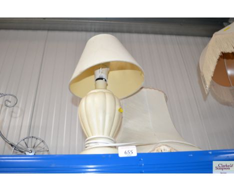 A pottery table lamp and shade and one other shade