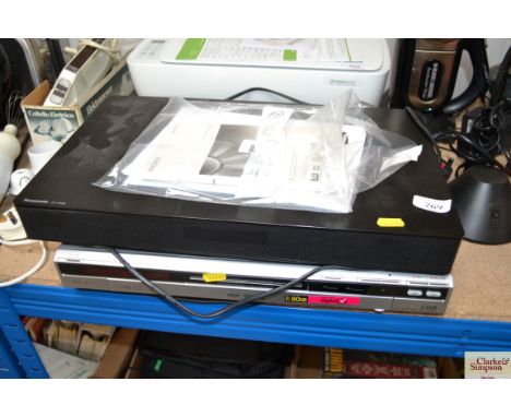 A Panasonic amplifier; and a Sony DVD player 