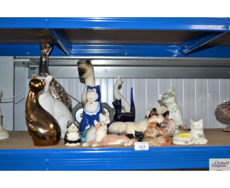 A quantity of various cat ornaments and a clock barometer