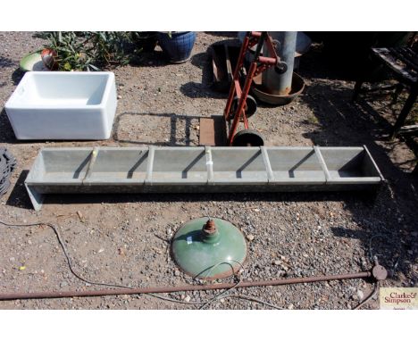 A galvanised feeding trough