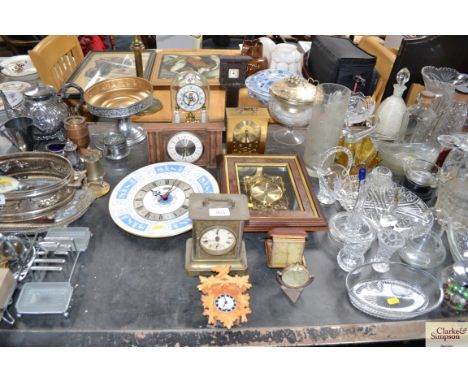 A quantity of various clocks to include a Amida pocket watch and holder in the form of a grandfather clock