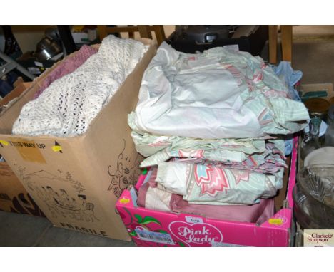 Two boxes of various curtains; throws etc