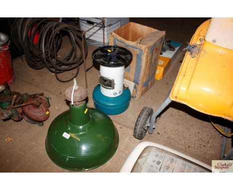 An enamel industrial light shade and a small Valor cooker