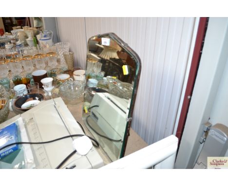 A bevel edged easel mirror