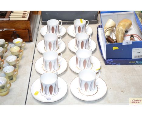 Eight Susie Cooper "Hyde Park" patterned cups and saucers