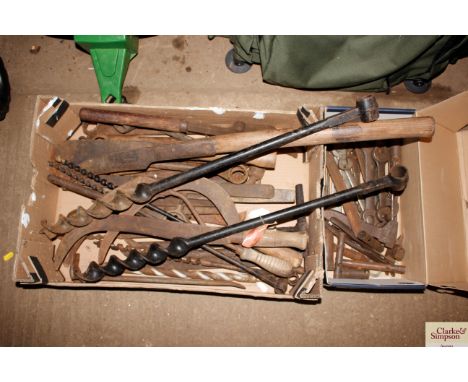 Two boxes of tools including spanners; borers; slashers etc