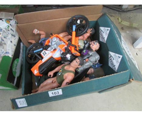 A box of Action man type figures