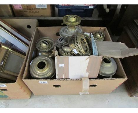 A box of oil lamp parts