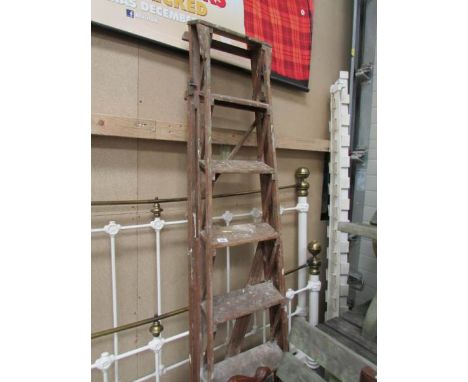 A wooden step ladder