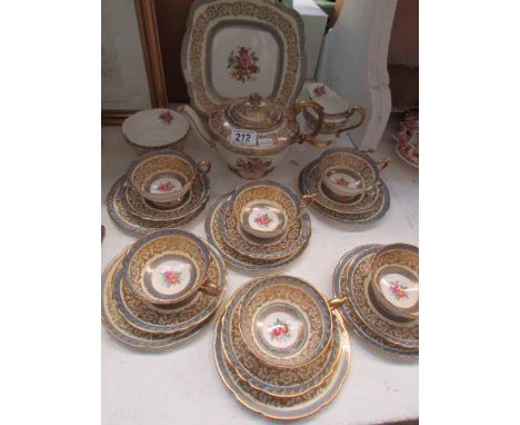 A Paragon tea set comprising 6 cups, saucers, teaplates and teapot etc