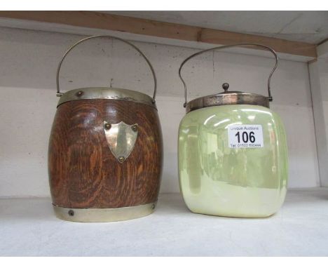 An oak biscuit barrel and a ceramic biscuit barrel