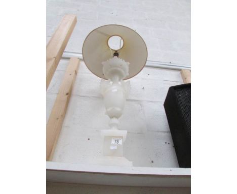An alabaster table lamp