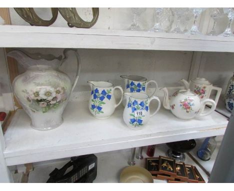 A large jug a/f, a set of 3 graduated Bristol jugs, a teapot and a coffee pot