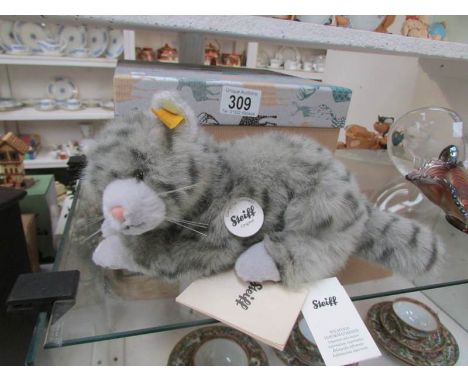 A boxed Steiff cat