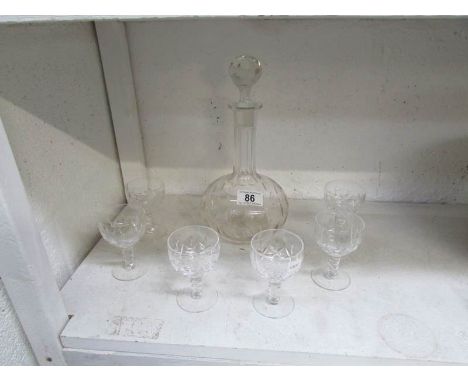 A glass decanter and 6 glasses