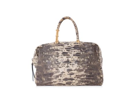 A LANVIN EMBOSSED LIZARD PRINT HANDBAG Comprising of lizard print embossed calfskin, gold-tone hardware and tote handles. LAN