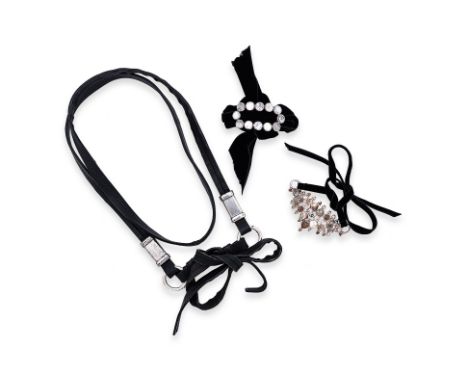 AN ASSORTMENT OF YVES SAINT LAURENT ACCESSORIES Comprising a black velvet choker featuring antiqued silver-tone adornment wit