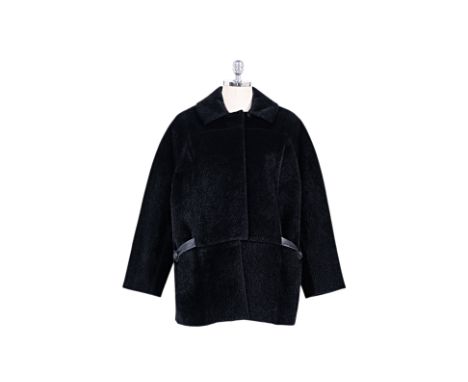 A DEREK LAM BLACK FAUX PONY HAIR COAT Comprising of a faux fur exterior, two faux leather trim pockets and concealed snap but
