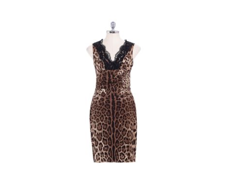 A DOLCE &amp; GABBANA LEOPARD PRINT SHEATH DRESS Comprising a silk sheath dress in leopard print with black lace trim, 'V' sh