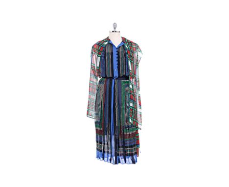 A SACAI MULTICOLORED PLEAT DRESS Comprising a plaid patterned print throughout with a buttoned closure at front, pleated deta