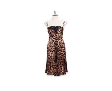 A DOLCE &amp; GABBANA LEOPARD PRINT DRESS WITH LACE SLIP Comprising a leopard print dress with black lace detailed slip, spag