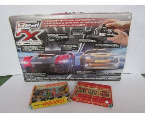 A Real FX Slotless racing set and two vintage Waddingtons games 