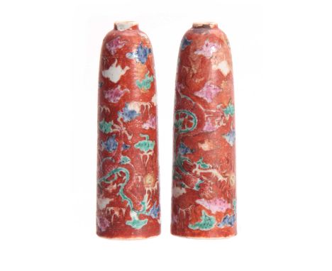 AN UNUSUAL PAIR OF LATE 18TH EARLY 19TH CENTURY CHINESE CERAMIC TAPERING SPILL VASES with internal raised bases and swirling 