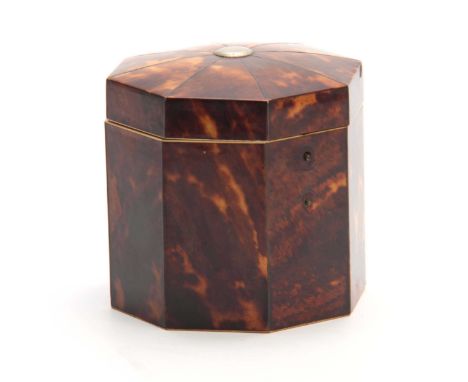 A 19TH CENTURY TORTOISESHELL VENEERED OCTAGONAL SHAPED TEA CADDY with silver wire edges having a hinged lid revealing an inne
