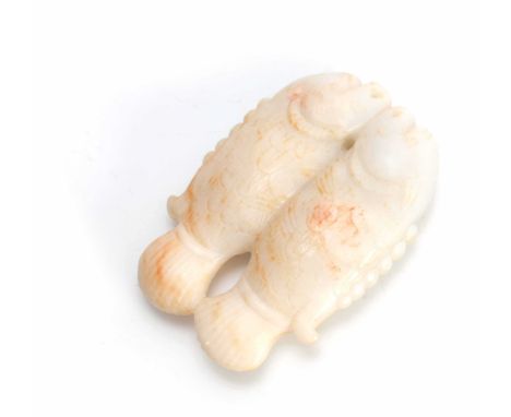 A CHINESE CARVED WHITE RUSTED JADE PENDANT depicting two fish 8.5cm overall 6cm deep 