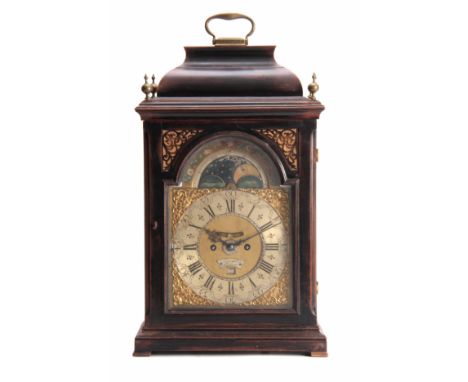 J WATSON, LONDON A GEORGE II EBONISED BRACKET CLOCK the case with inverted bell top above a moulded glazed door enclosing an 
