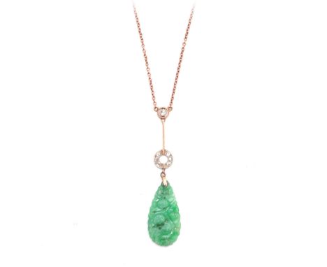 A JADE PENDANT with carved and pierced scrolled decoration, with diamond-set Gold hanging mount and slender chain  - pendant 