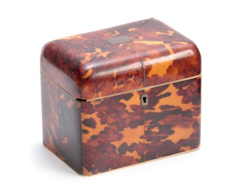 AN EARLY 19TH CENTURY TORTOISESHELL TEA CADDY with rounded corners having ivory and silver wire inlays, the hinged lid with i