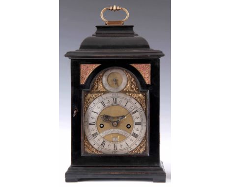 GEORGE GORDON, LONDON. A SMALL EARLY 18TH CENTURY EBONISED BRACKET CLOCK the case with inverted bell top surmounted by a bras