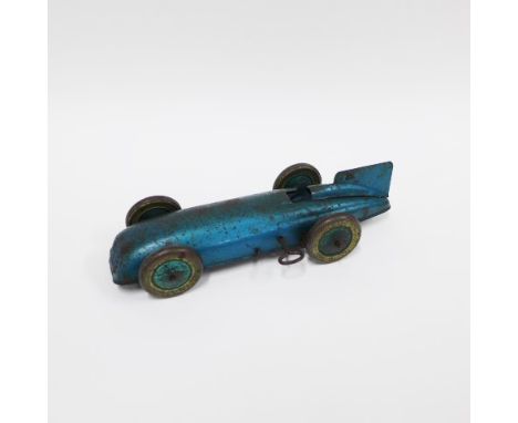 Vintage tin plate model of a car and driver, 20cm long 