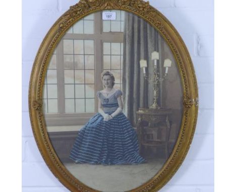 Full length photographic portrait print of a lady, framed under glass within an ornate oval gilt frame, size overall 50 x 65c