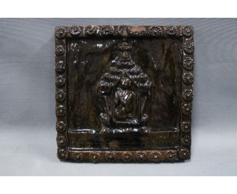 Eastern treacle glazed tile plaque, 24 x 23cm 