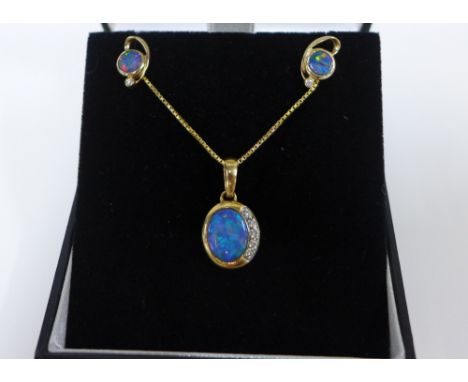 9ct gold opal and diamond pendant on a 9ct gold chain together with matching 9ct gold earrings (2) 