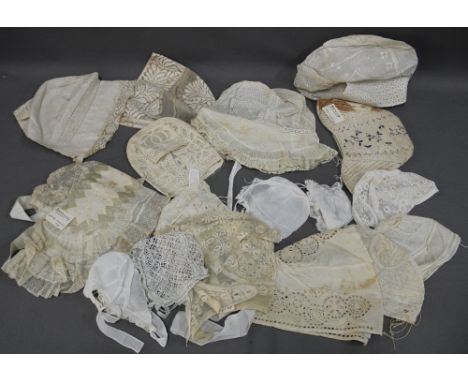 Collection of antique and vintage lace hats and bonnets, to include examples from Normandy and Hungary, etc  (a lot) 