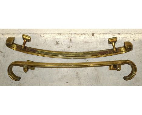 A pair of large and heavy bronze door handles or banister rails, 85cm long, (2). 