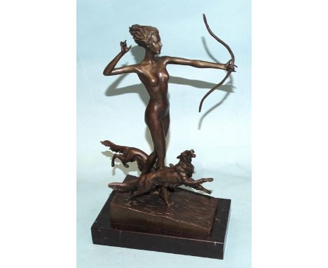 After Lorenzl, an Art Deco-style bronze of Artemis modelled as a nude female figure holding a bow, with two dogs, foundry mar