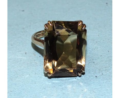 A 9ct gold dress ring set a large scissor-cut citrine, 18 x 13mm, size L, 5.7g. 