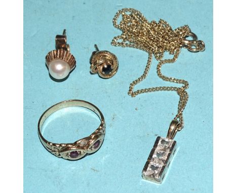 An unmarked gold gem-set ring, size K, a synthetic white stone pendant, (on 9ct gold neck chain) and two ear studs, gross wei