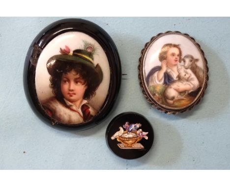 A micro-mosaic lapel button depicting the Doves of Pliny, 22mm diameter, a 19th century oval jet brooch inset a ceramic panel