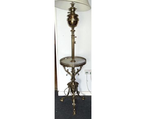 An impressive antique brass adjustable oil lamp stand, the "Messenger's Patent" reservoir on column and circular galleried sh