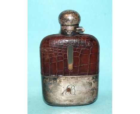 A small glass silver and leather hip flask by James Dixon &amp; Sons, Sheffield 1923, with etched initial to silver, 11.5cm h