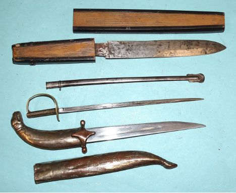 A novelty steel knife and scabbard in the form of a fan, 31cm long, a paper knife in the form of a military sword and a paper