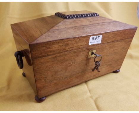 A 19th century rosewood tea caddy with wooden ring handles, on bun feet, 12 ½" wide 