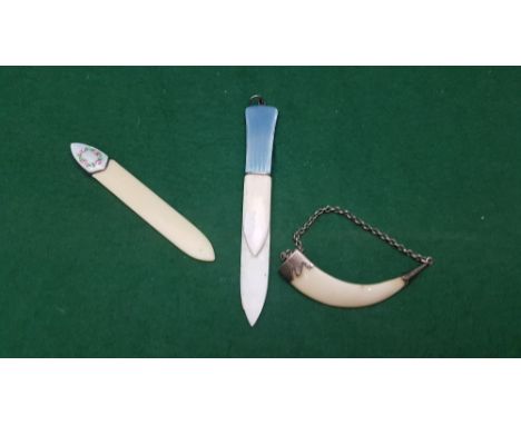 A group of accessories – 2 ivory bookmarks with enamel tops, an ornamental miniature ivory tusk (“made in Kenya”) (3)