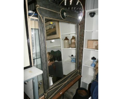 large heavy metal framed mirror