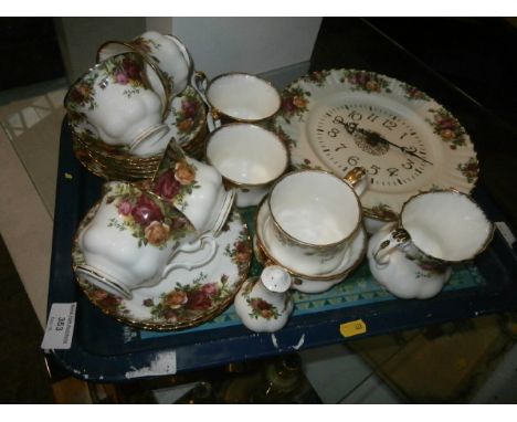 tray of old country roses table ware and clock